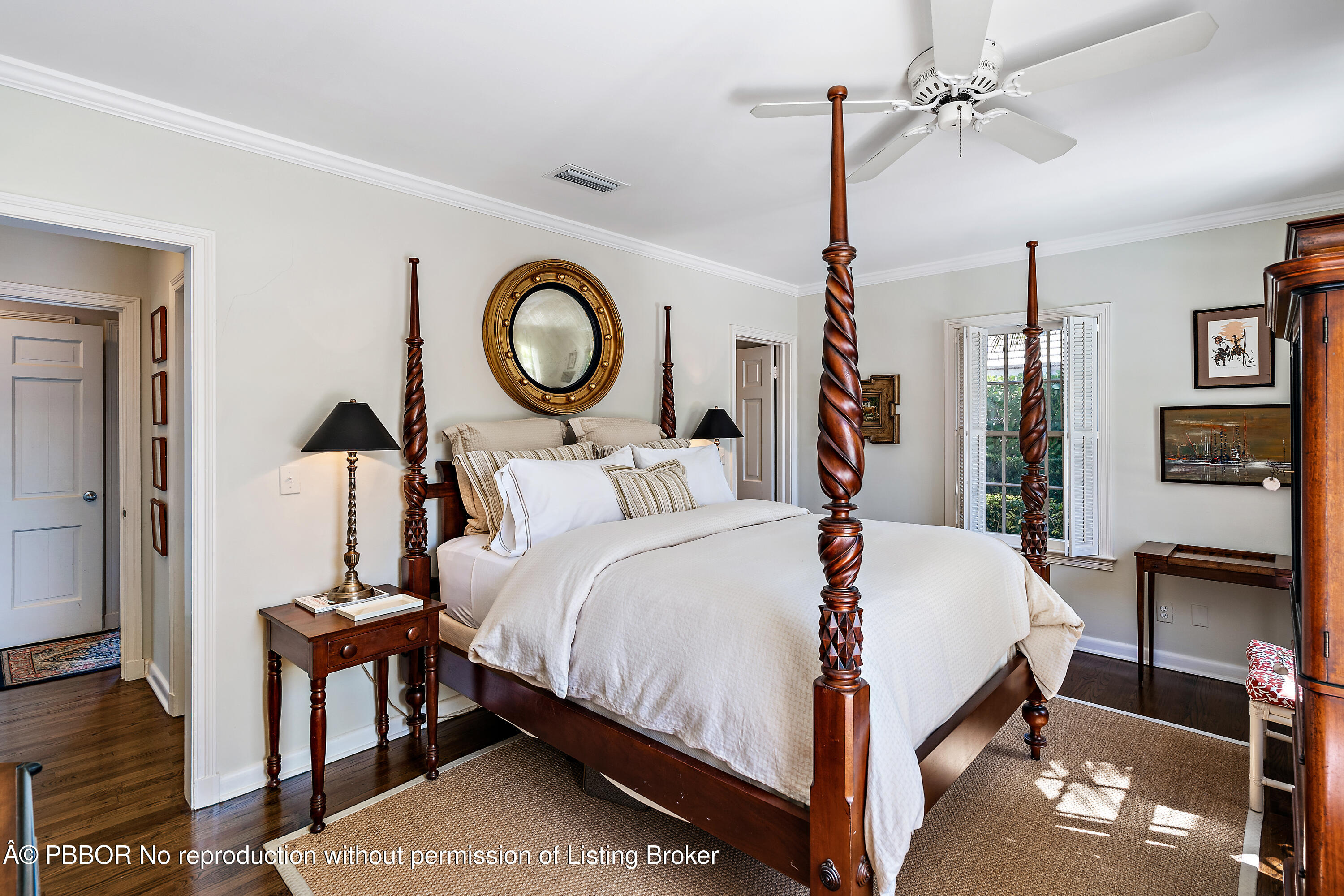 230 Colonial Lane Palm Beach, FL 33480 - Photo 8 of 17 a bed room with a bed and a chandelier