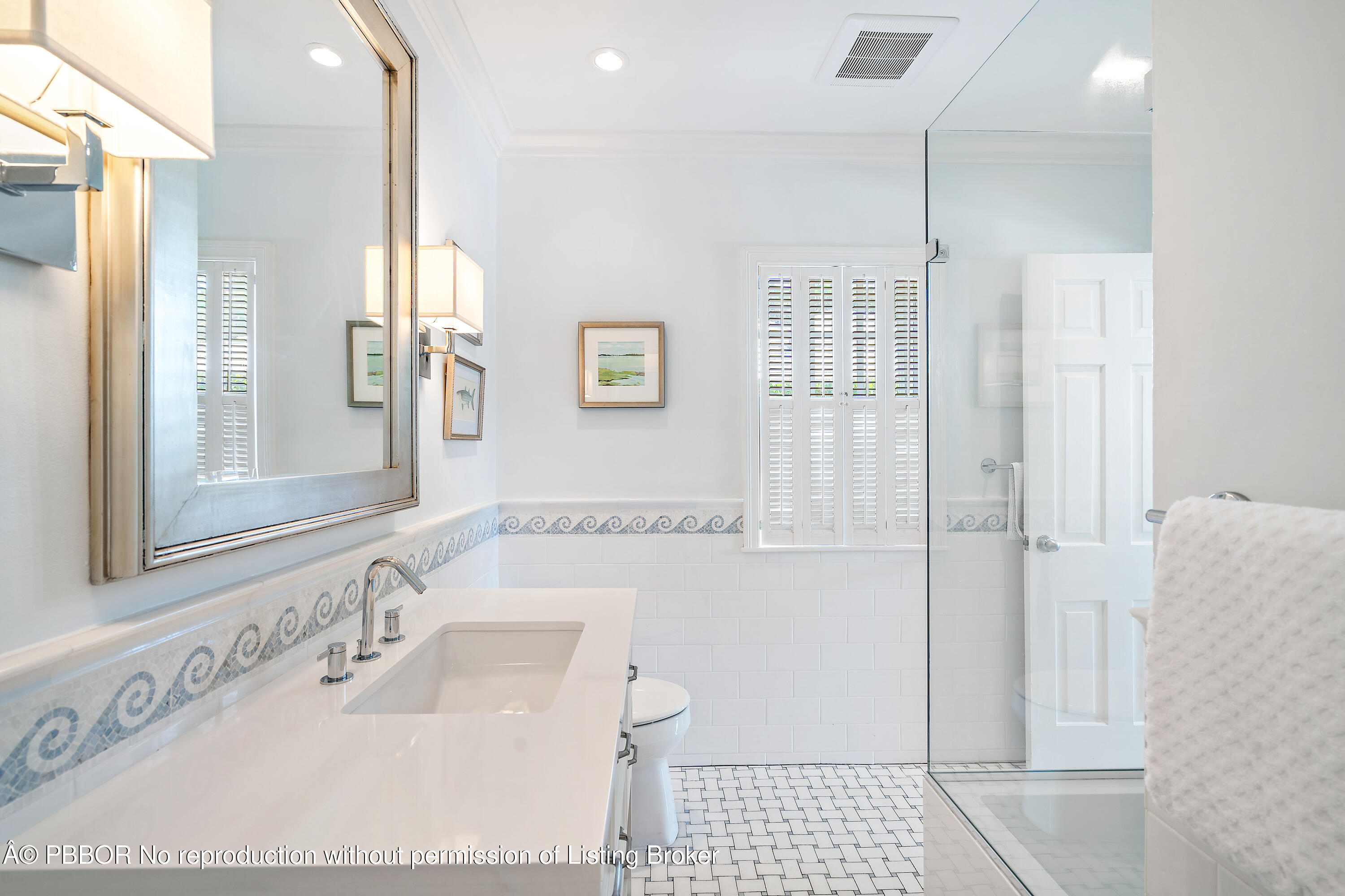 230 Colonial Lane Palm Beach, FL 33480 - Photo 9 of 17 a bathroom with a sink a toilet and shower