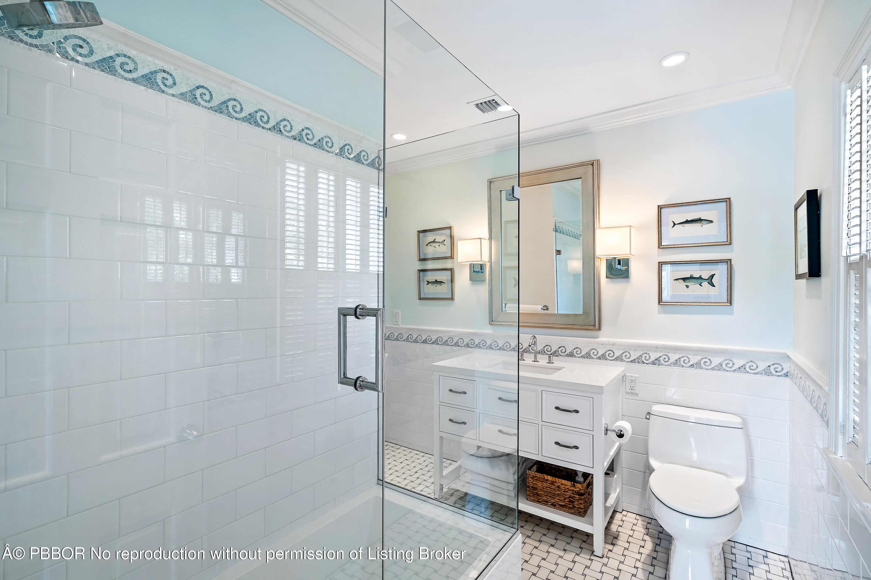 230 Colonial Lane Palm Beach, FL 33480 - Photo 10 of 17 a spacious bathroom with a granite countertop toilet sink and mirror