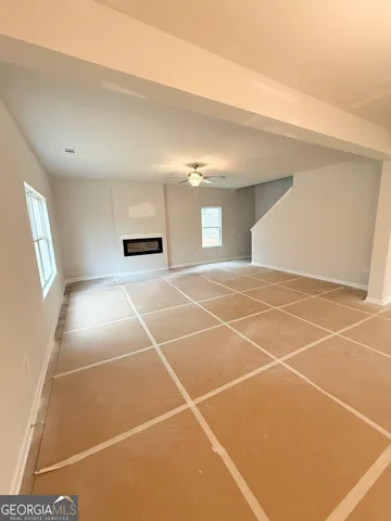 a view of an empty room with a sink
