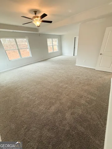 a view of a room with an empty space