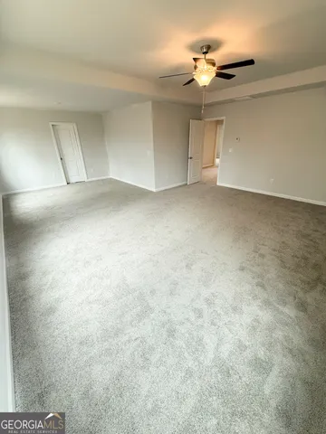 a room with a stove and a sink