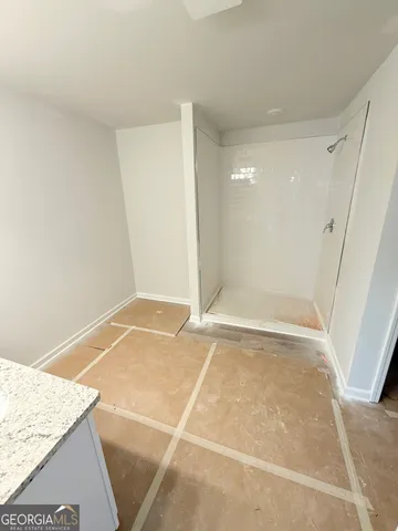 a view of a room with racks on the wall