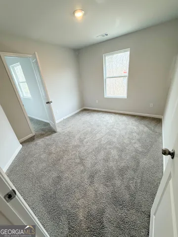 a black and white photo of a house