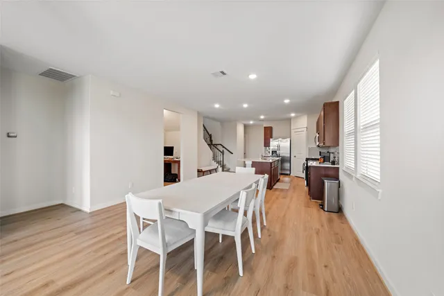 a view of a dining room with furniture