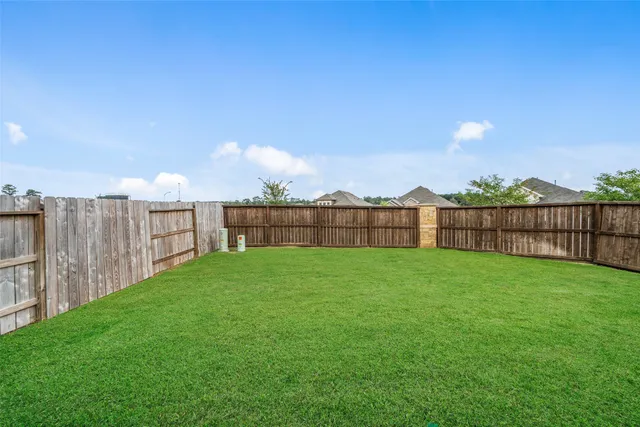 a view of a backyard with a garden