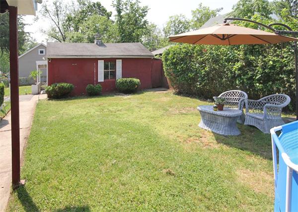 248 Merrimac Avenue Springfield, MA 01104 - Photo 16 of 16 a view of backyard with outdoor seating and plants