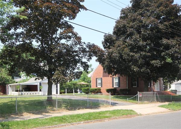 248 Merrimac Avenue Springfield, MA 01104 - Photo 2 of 16 a view of a house with a yard