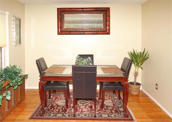 248 Merrimac Avenue Springfield, MA 01104 - Photo 6 of 16 a view of a dining room with furniture and wooden floor