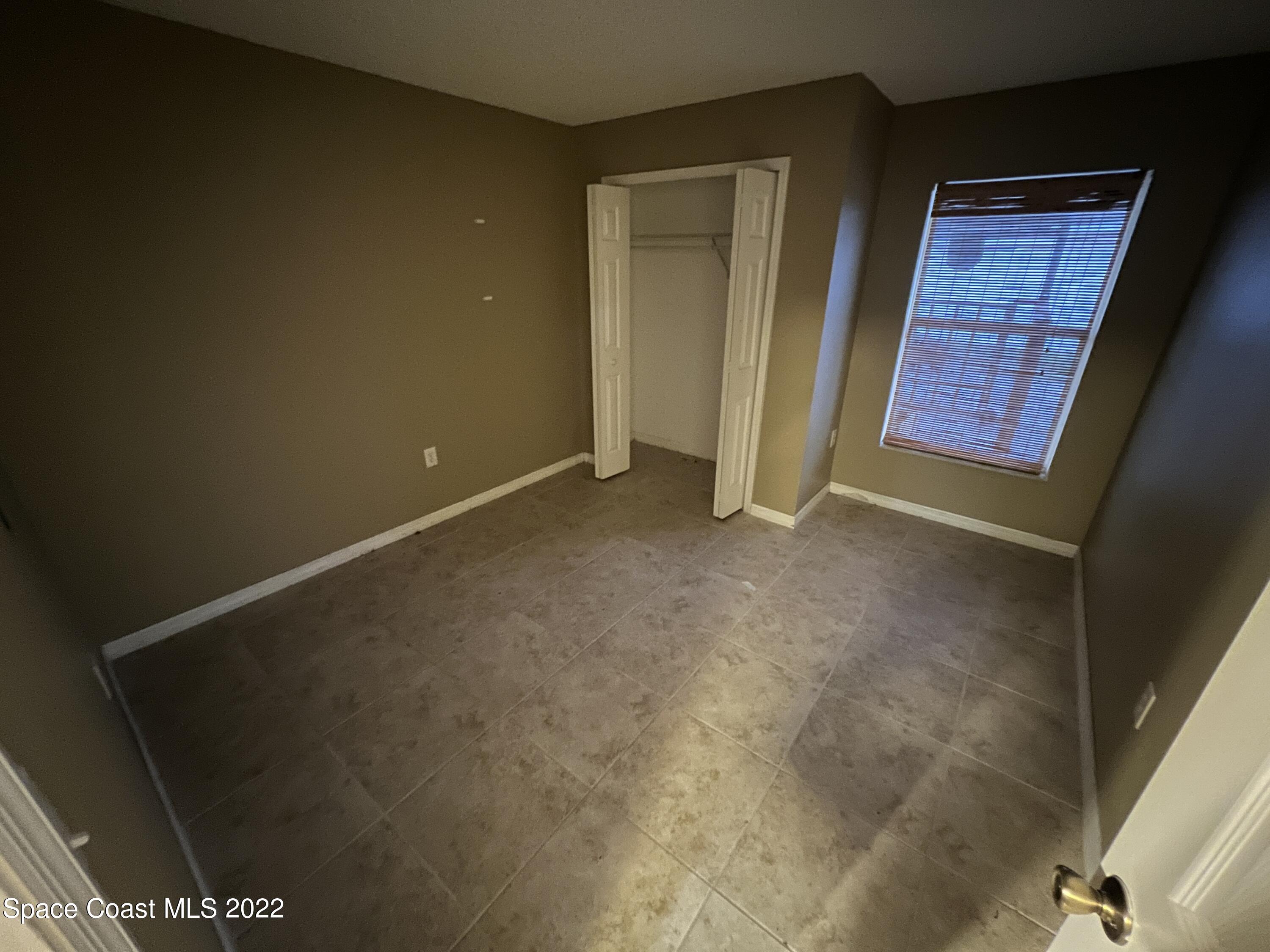 1873 Cleveland Street Northeast Palm Bay, FL 32905 - Photo 22 of 28 a view of an empty room