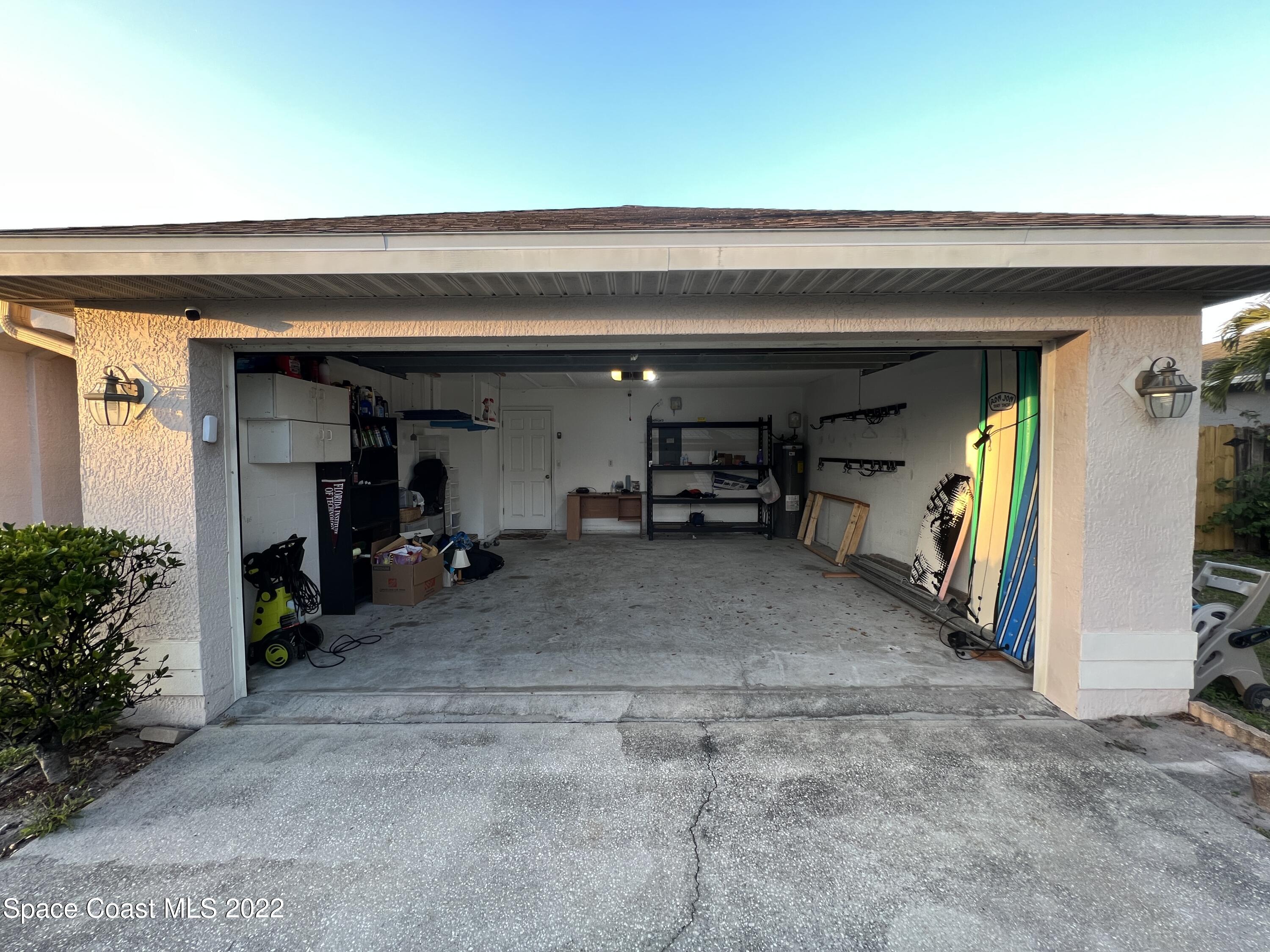 1873 Cleveland Street Northeast Palm Bay, FL 32905 - Photo 26 of 28 a view of a garage