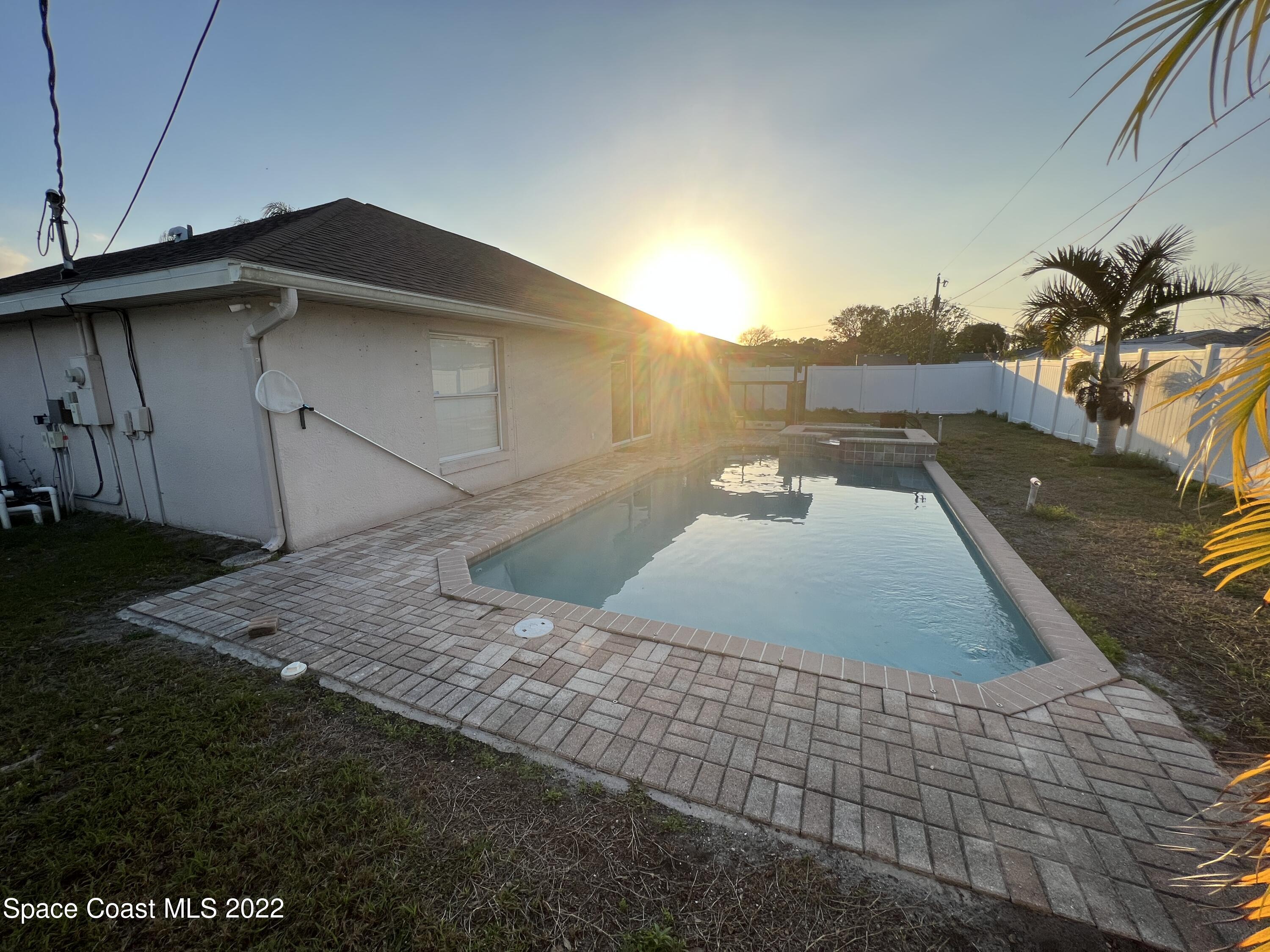 1873 Cleveland Street Northeast Palm Bay, FL 32905 - Photo 7 of 28 a view of a backyard of the house