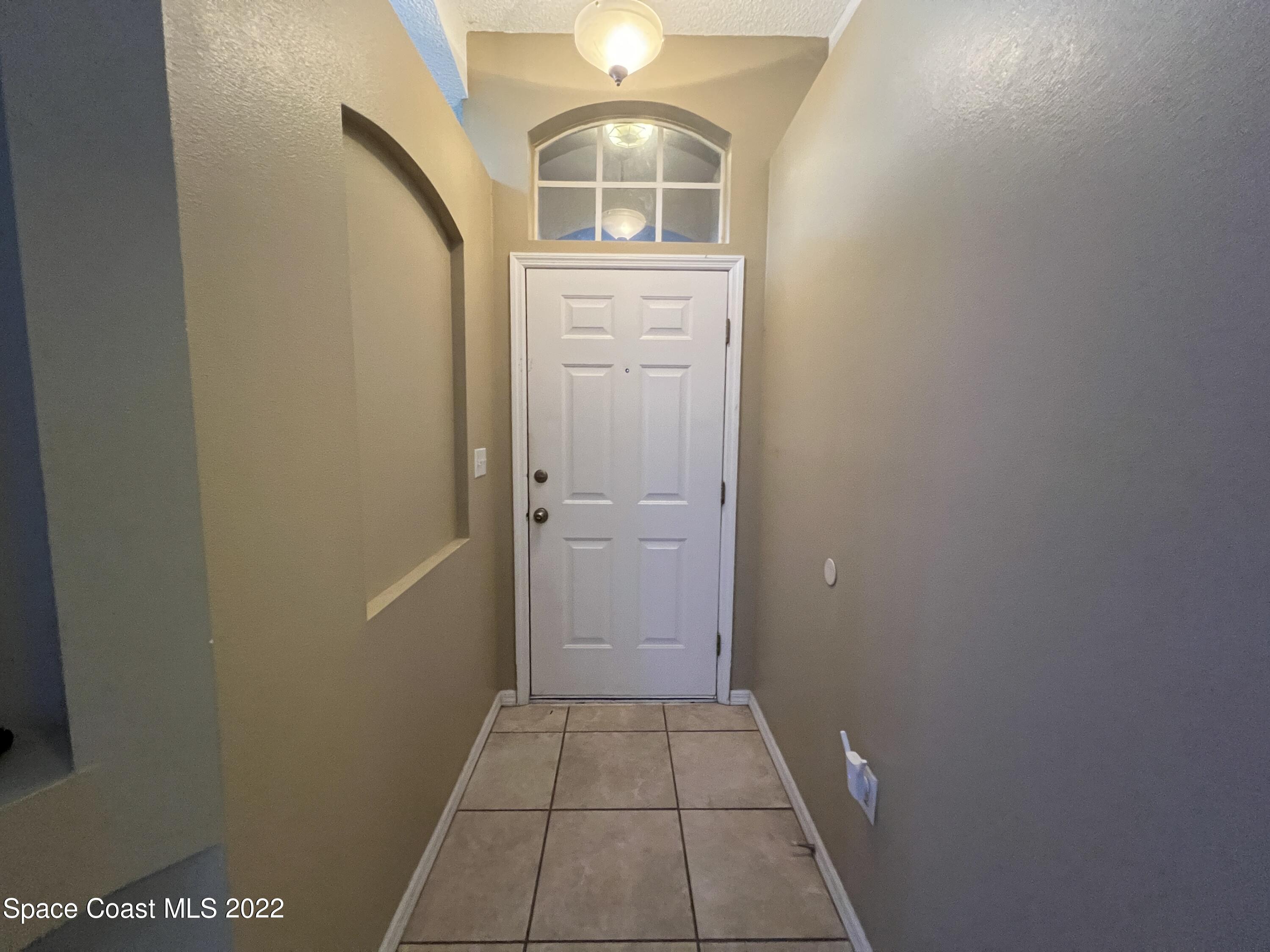 1873 Cleveland Street Northeast Palm Bay, FL 32905 - Photo 10 of 28 wooden floor in a gallery