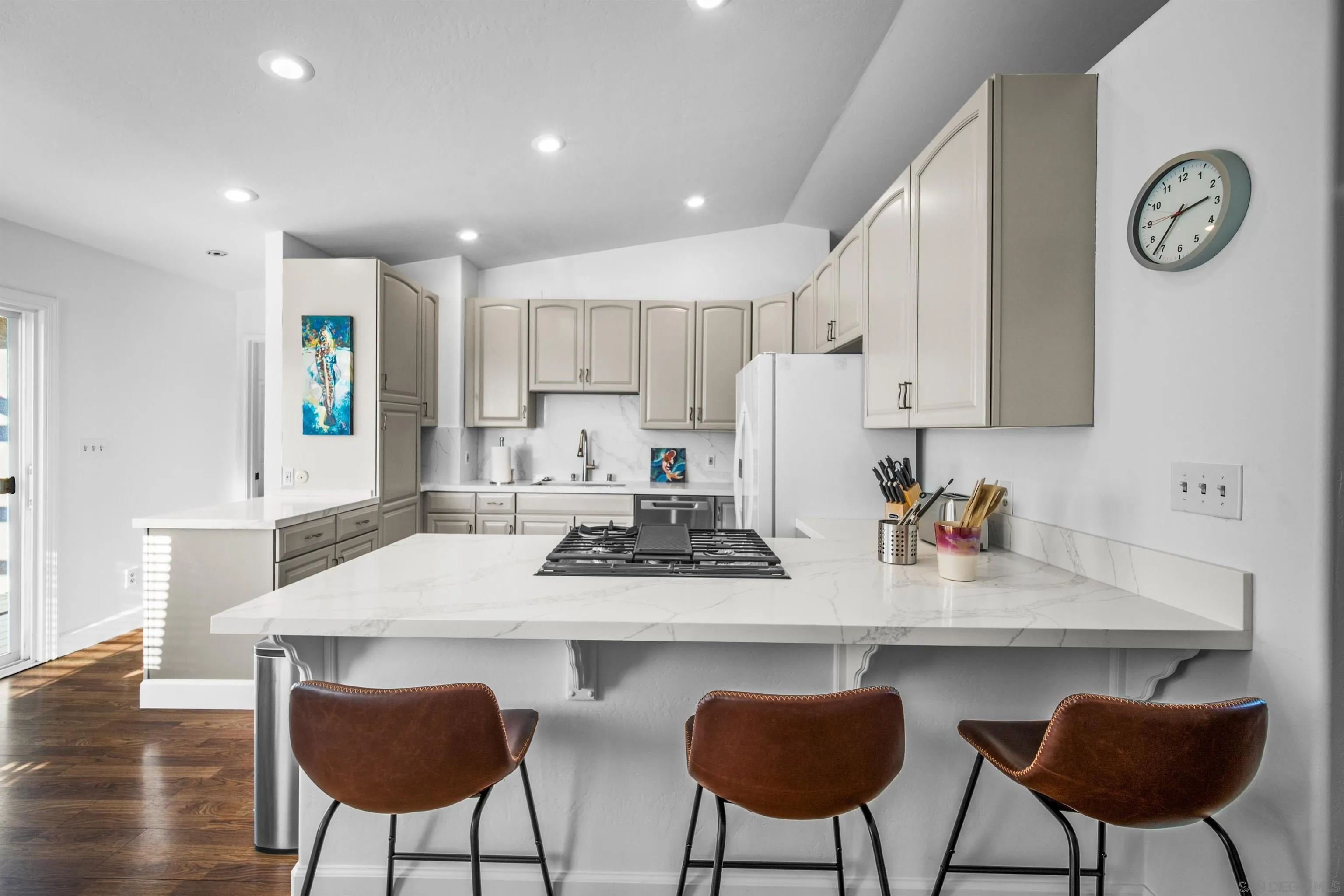 604 Monterey Drive Oceanside, CA 92058 - Photo 17 of 27 a view of kitchen with cabinets table and chairs