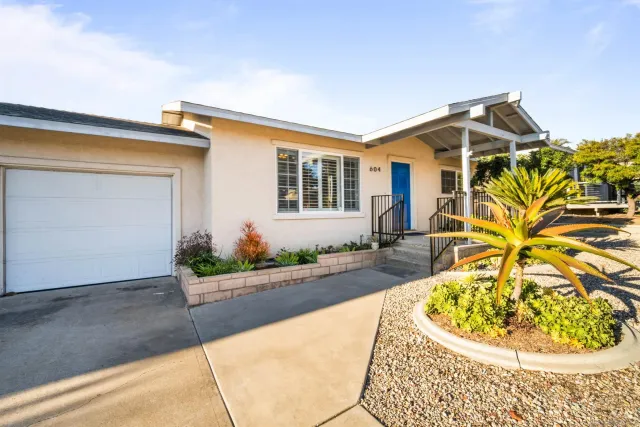 a view of a house with a patio
