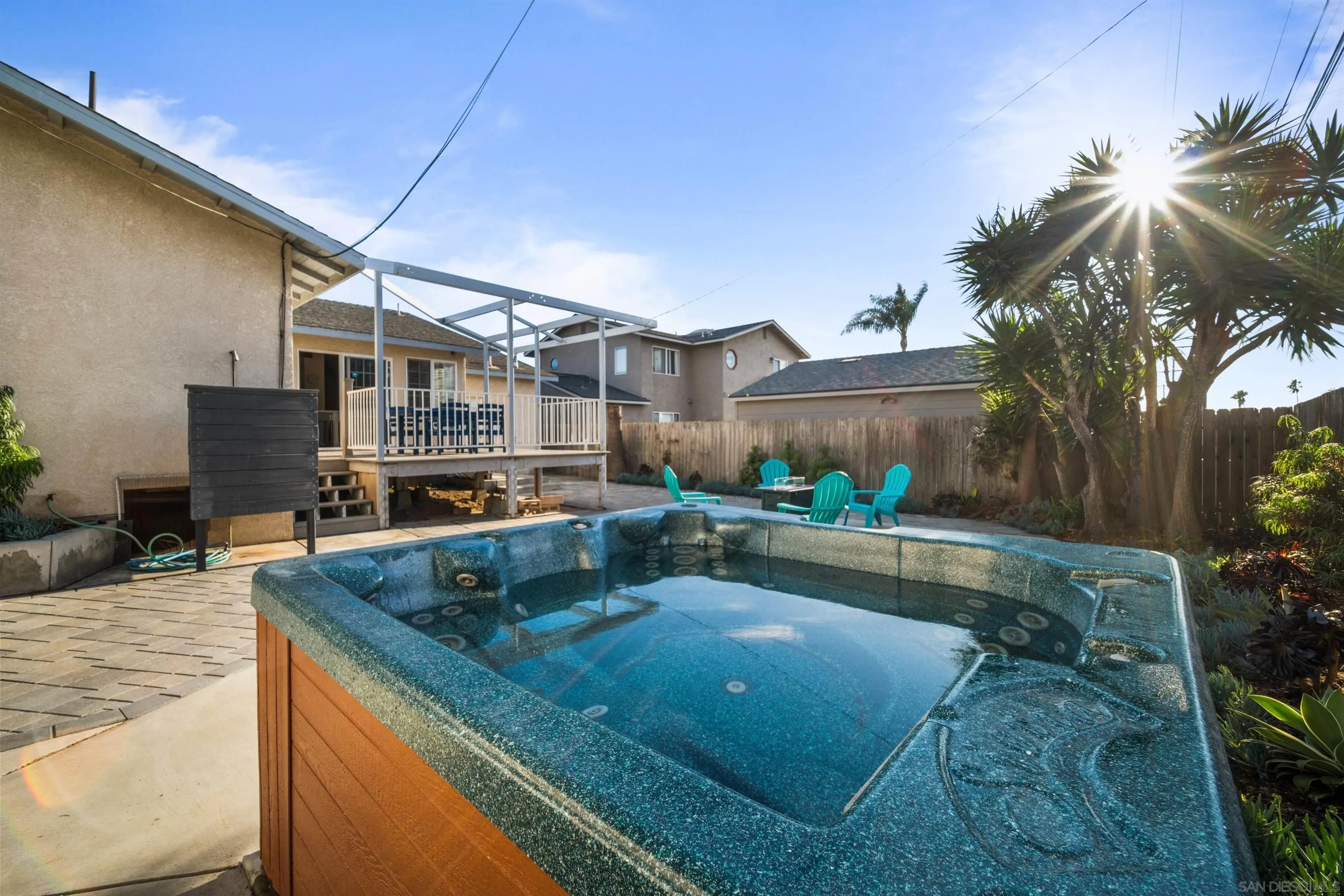604 Monterey Drive Oceanside, CA 92058 - Photo 7 of 27 a view of outdoor kitchen with dining table and chairs