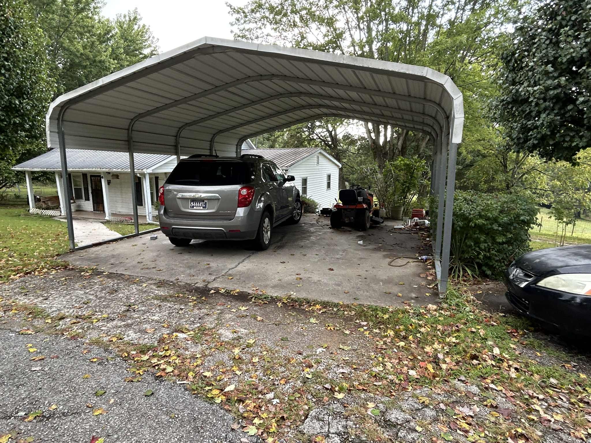 1702 Johnson Chapel Road Sparta, TN 38583 - Photo 4 of 9 a view of a car parked in a yard