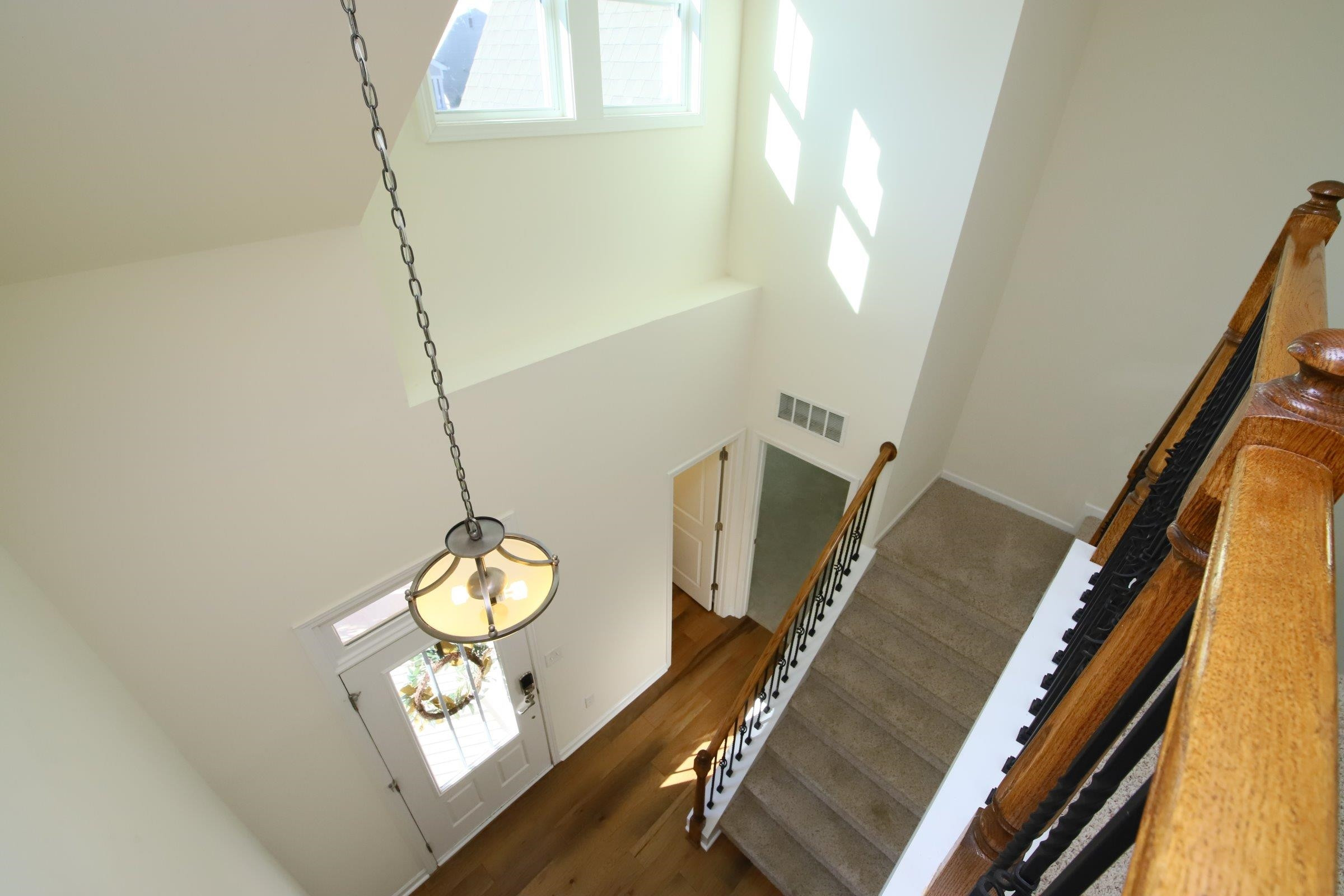 833 Wildflower Ridge Road Wake Forest, NC 27587 - Photo 8 of 46 Looking down to foyer