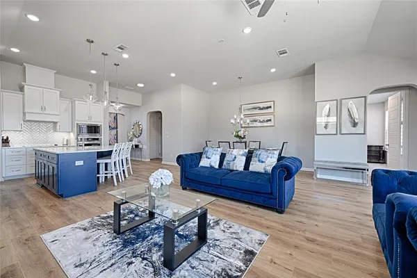 a living room with furniture and a table
