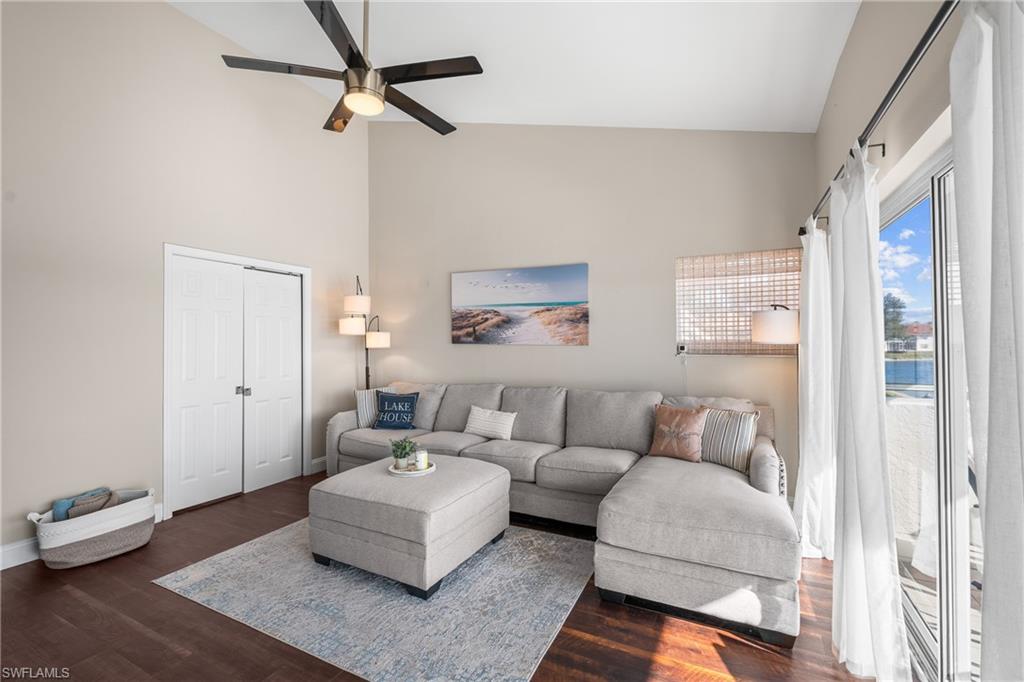 541 Windsor Square Naples, FL 34104 - Photo 12 of 25 a living room with furniture and a window