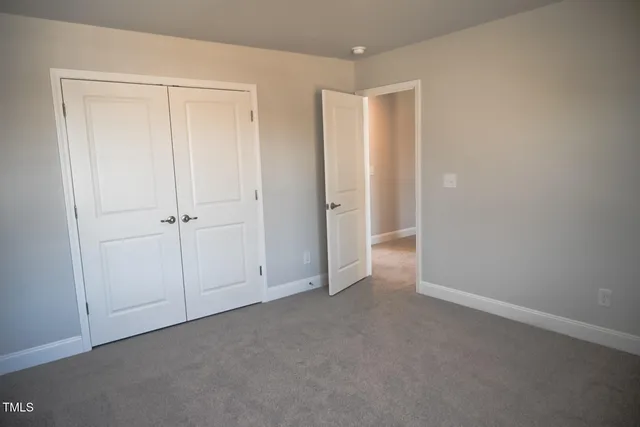 a view of a garden with an outdoor seating