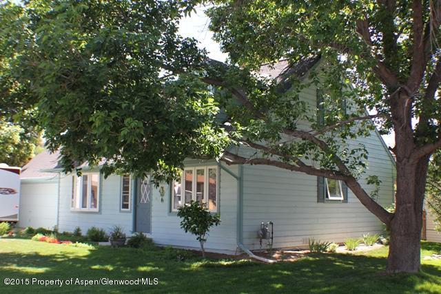 960 Cedar Drive Rifle, CO 81650 - Photo 2 of 27 a front view of a house with garden