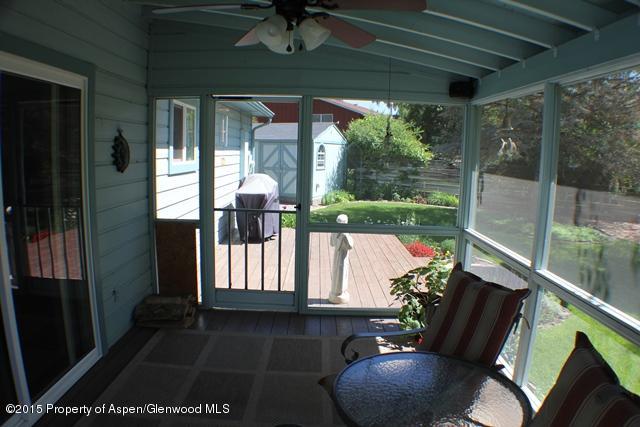960 Cedar Drive Rifle, CO 81650 - Photo 21 of 27 a front view of a house with garden