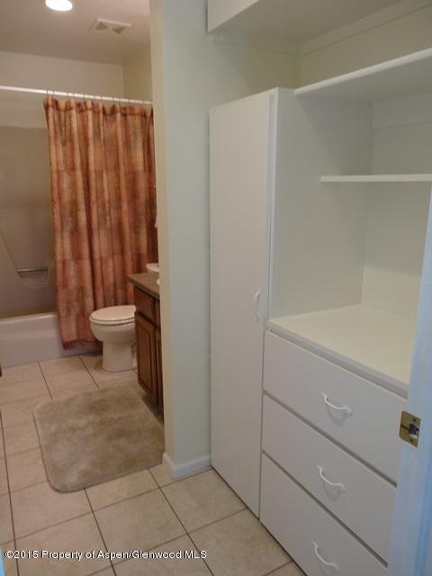 960 Cedar Drive Rifle, CO 81650 - Photo 10 of 27 a bathroom with a shower and a toilet