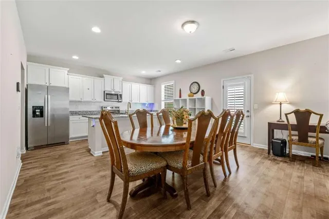 a view of a dining room with furniture