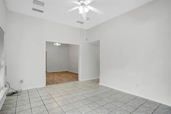 a view of an empty room and window