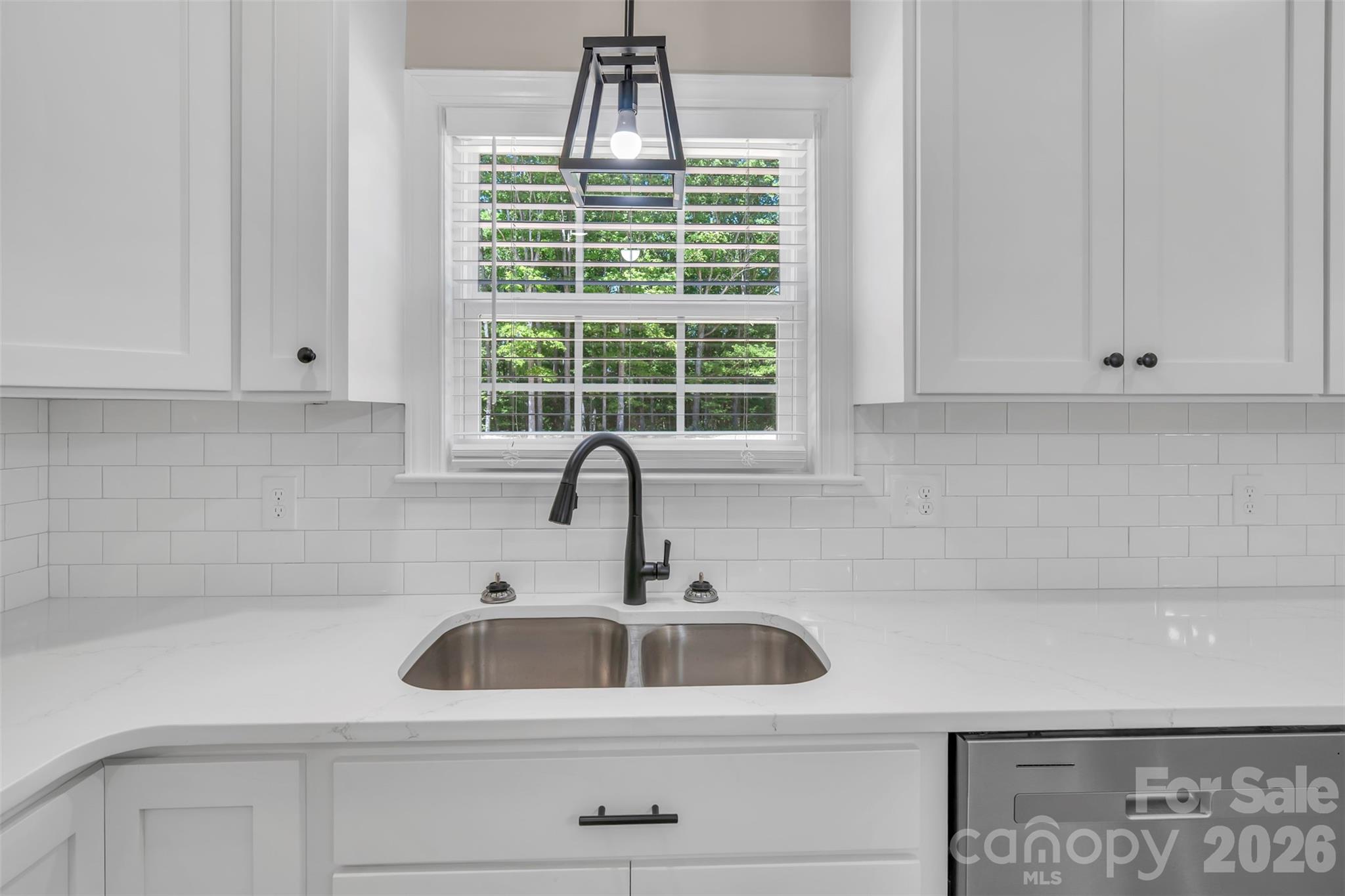 0 Cimmeron Road Lancaster, SC 29720 - Photo 12 of 29 a kitchen with white cabinets and a sink