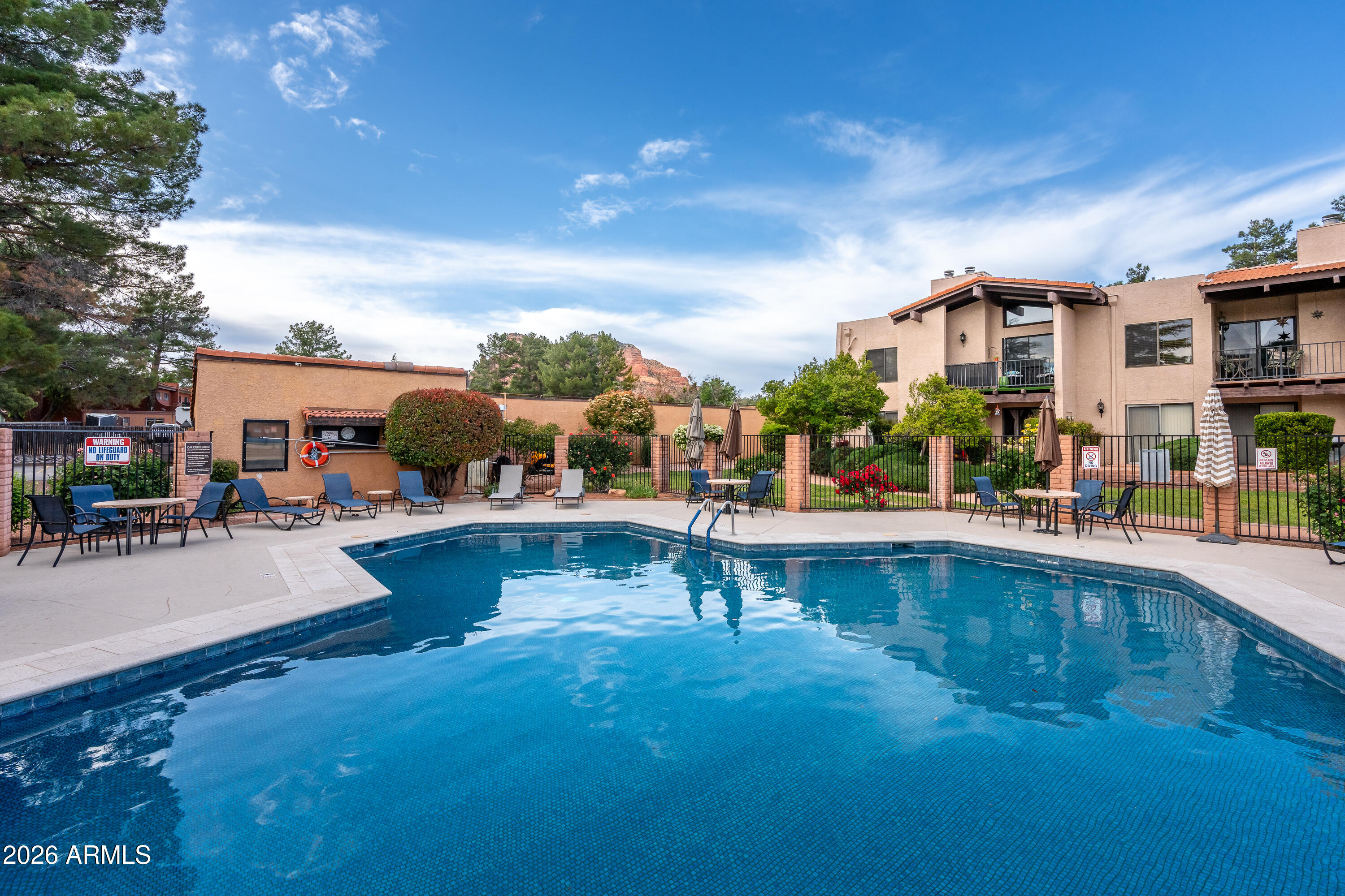 65 Verde Valley School Road, Unit B14 Sedona, AZ 86351 - Photo 13 of 25 a view of swimming pool with outdoor seating