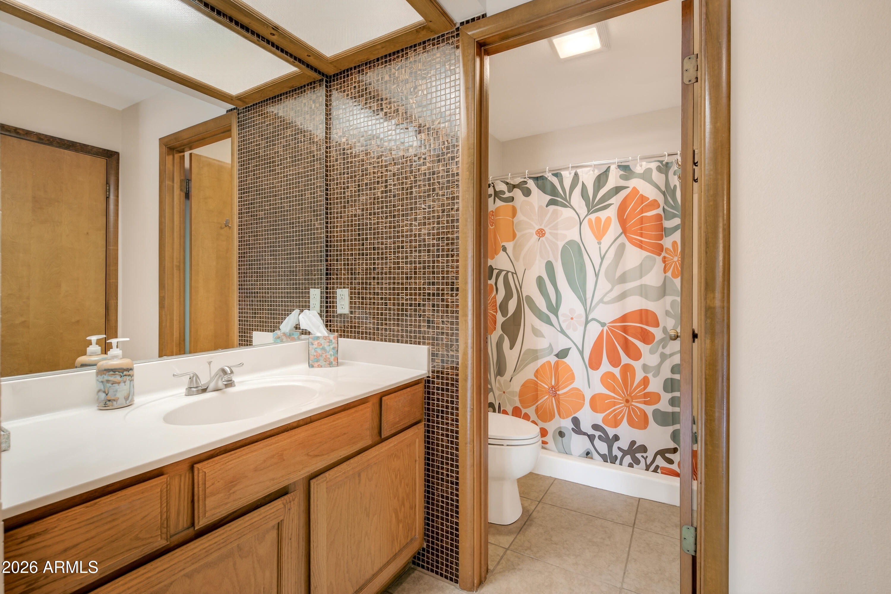 65 Verde Valley School Road, Unit B14 Sedona, AZ 86351 - Photo 19 of 25 a bathroom with a sink and a mirror