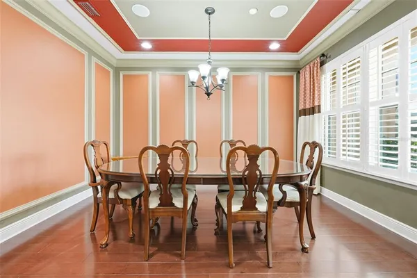 a kitchen with stainless steel appliances granite countertop a refrigerator stove top oven a sink and dishwasher