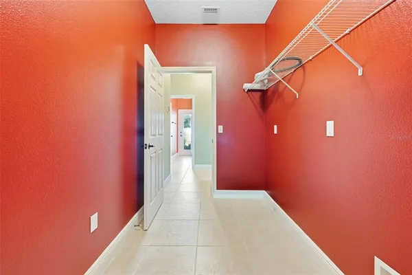 a bathroom with a bathtub a sink and a large mirror