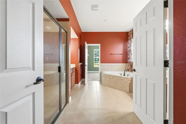 an empty room with a empty space and windows