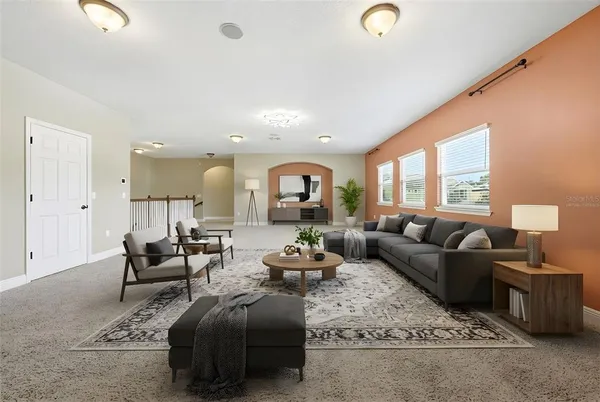 a bath tub sitting next to a bathroom sink