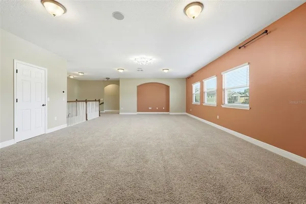 a bathroom with a toilet and a bathtub