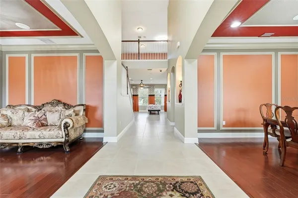a kitchen with granite countertop a sink stove and refrigerator