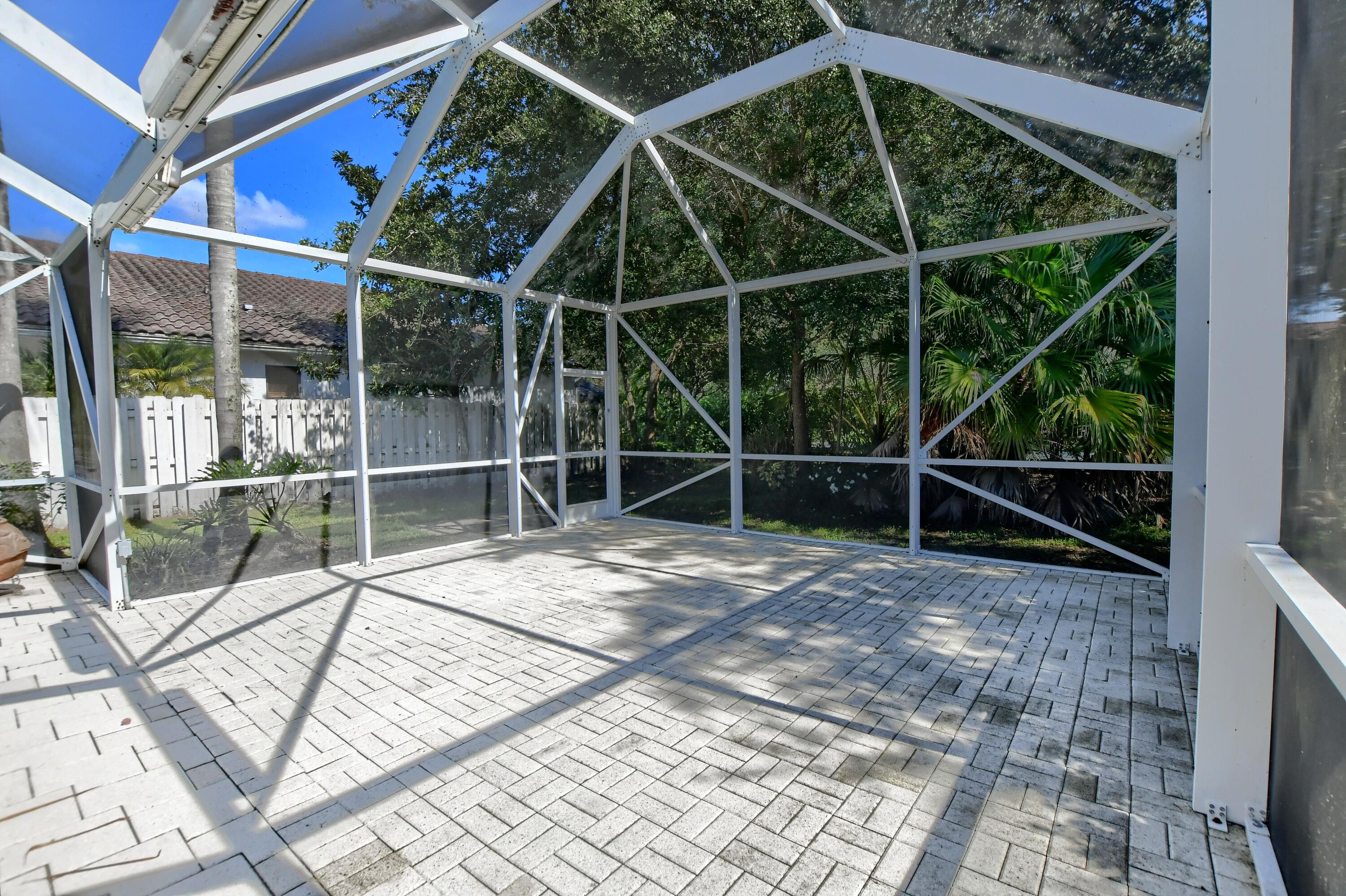 8687 Vía Reale Boca Raton, FL 33496 - Photo 33 of 49 Behind Pool