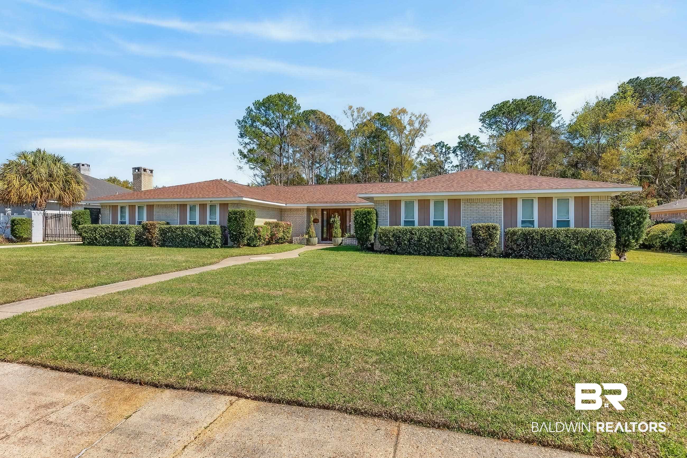 1271 Spring Valley Drive South Mobile, AL 36693 - Photo 55 of 56 Ranch-style house with a front lawn and brick siding