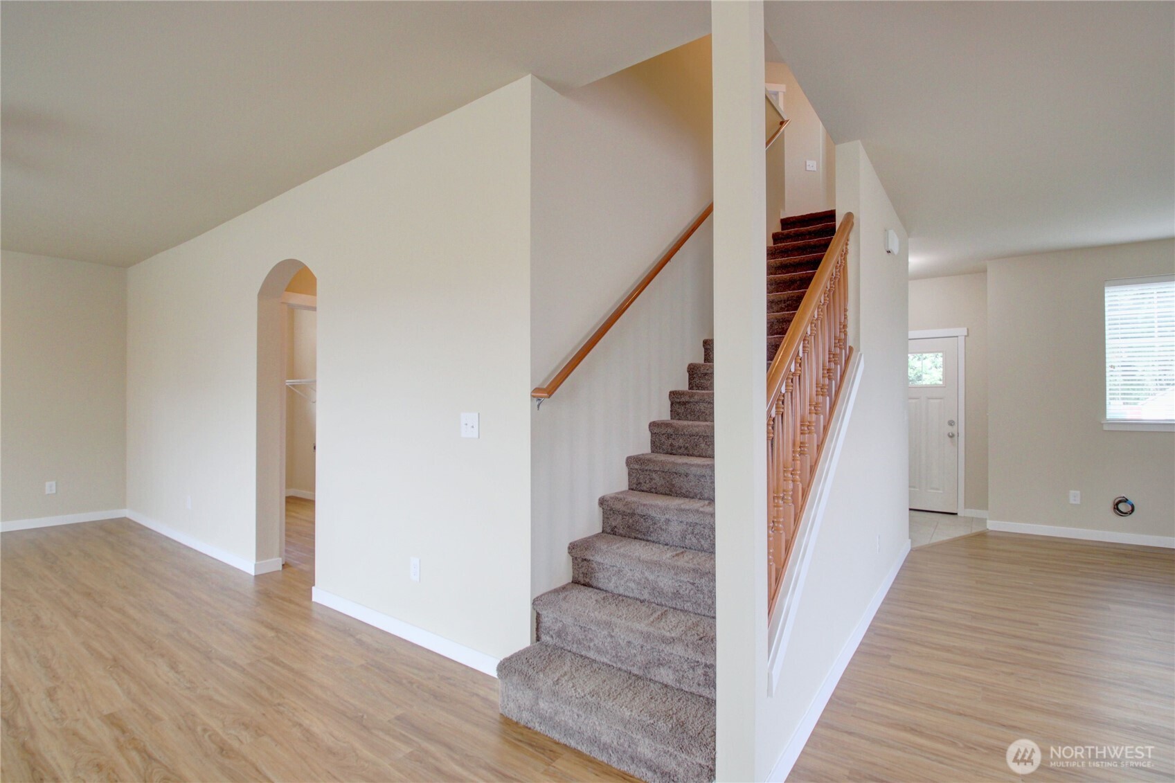 1709 Hillcrest Loop Mount Vernon, WA 98274 - Photo 20 of 40 a view of a hallway with wooden floor and staircase