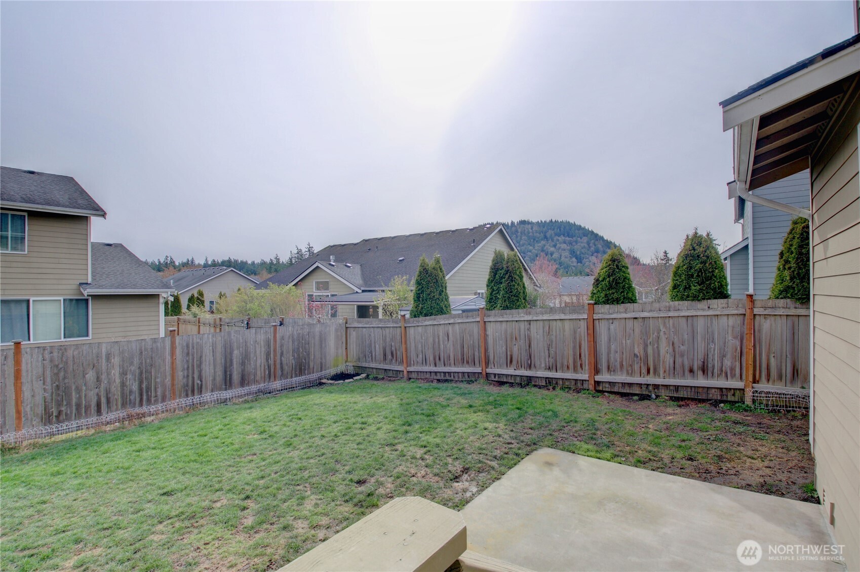1709 Hillcrest Loop Mount Vernon, WA 98274 - Photo 24 of 40 a view of backyard with wooden fence