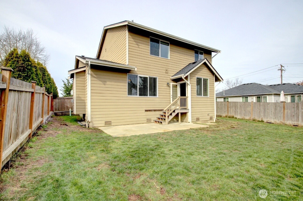 1709 Hillcrest Loop Mount Vernon, WA 98274 - Photo 26 of 40 a view of a house with backyard and garden