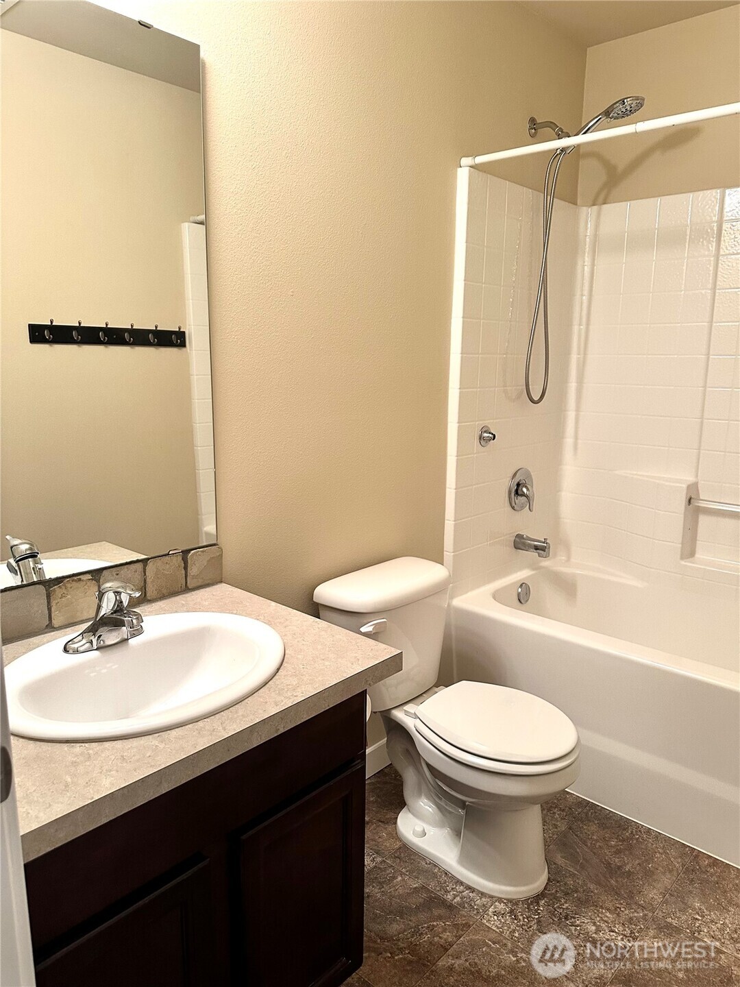 1709 Hillcrest Loop Mount Vernon, WA 98274 - Photo 33 of 40 a bathroom with a sink a toilet and shower