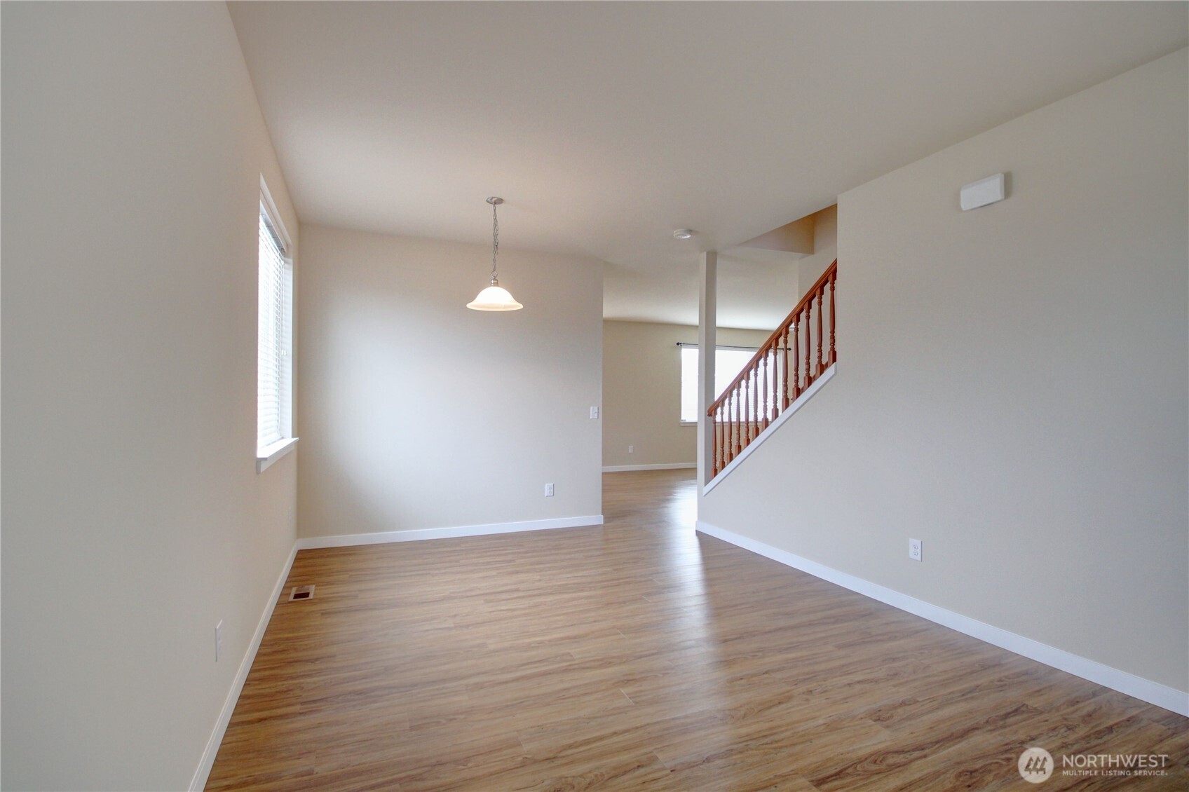 1709 Hillcrest Loop Mount Vernon, WA 98274 - Photo 7 of 40 a view of an empty room with wooden floor