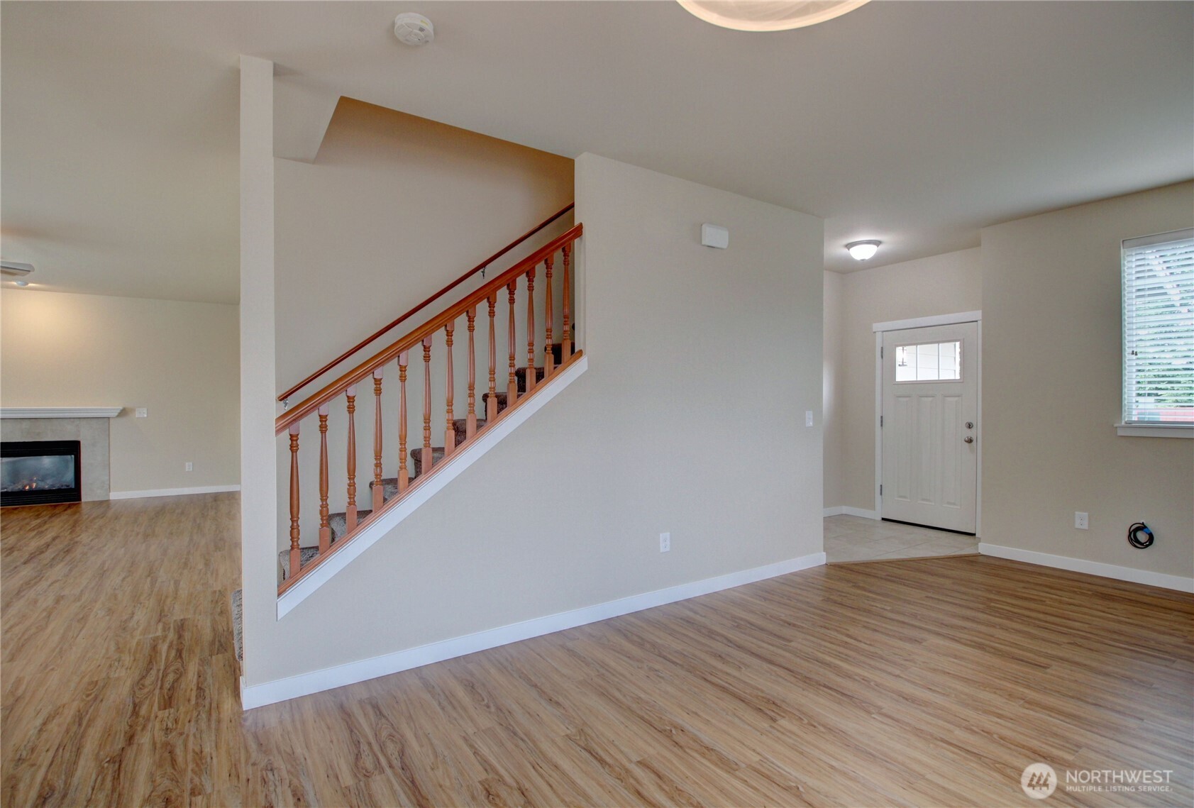1709 Hillcrest Loop Mount Vernon, WA 98274 - Photo 8 of 40 wooden floor in an empty room with a window
