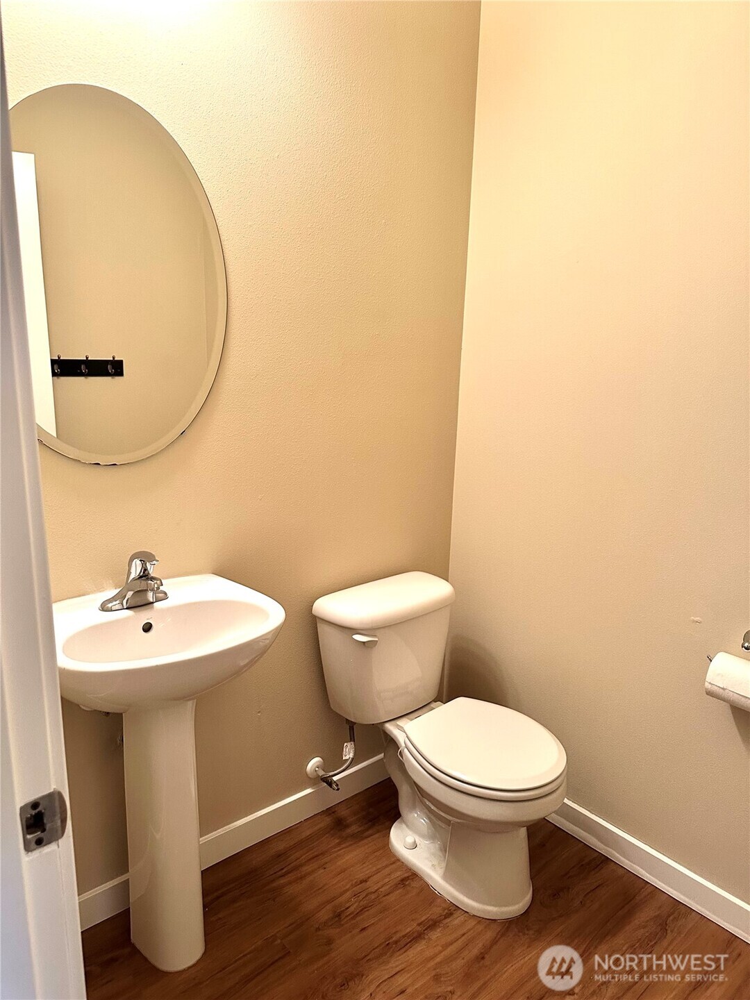 1709 Hillcrest Loop Mount Vernon, WA 98274 - Photo 10 of 40 a white toilet sitting next to a bathroom sink