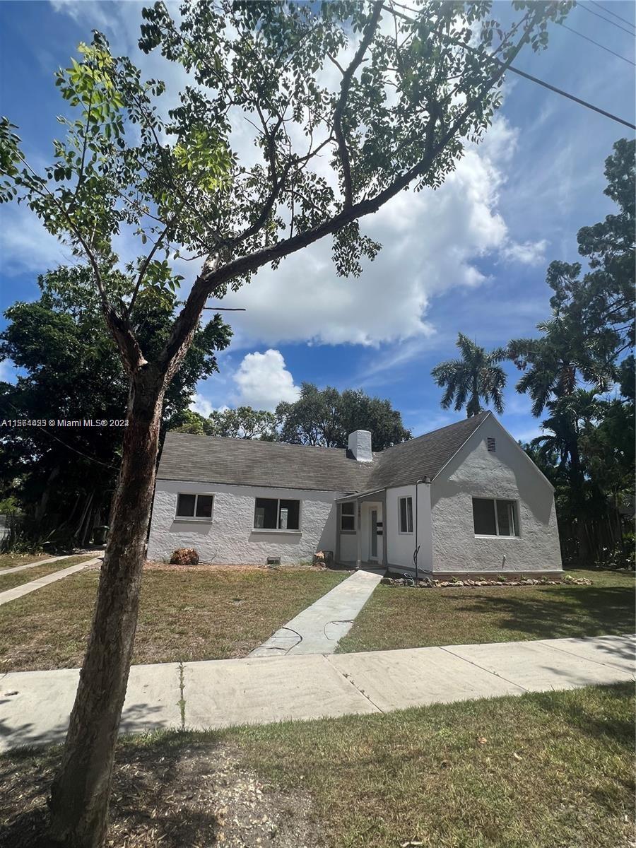 245 Southwest 24th Road, Unit 1 Miami, FL 33129 - Photo 1 of 14 a house view with a backyard space