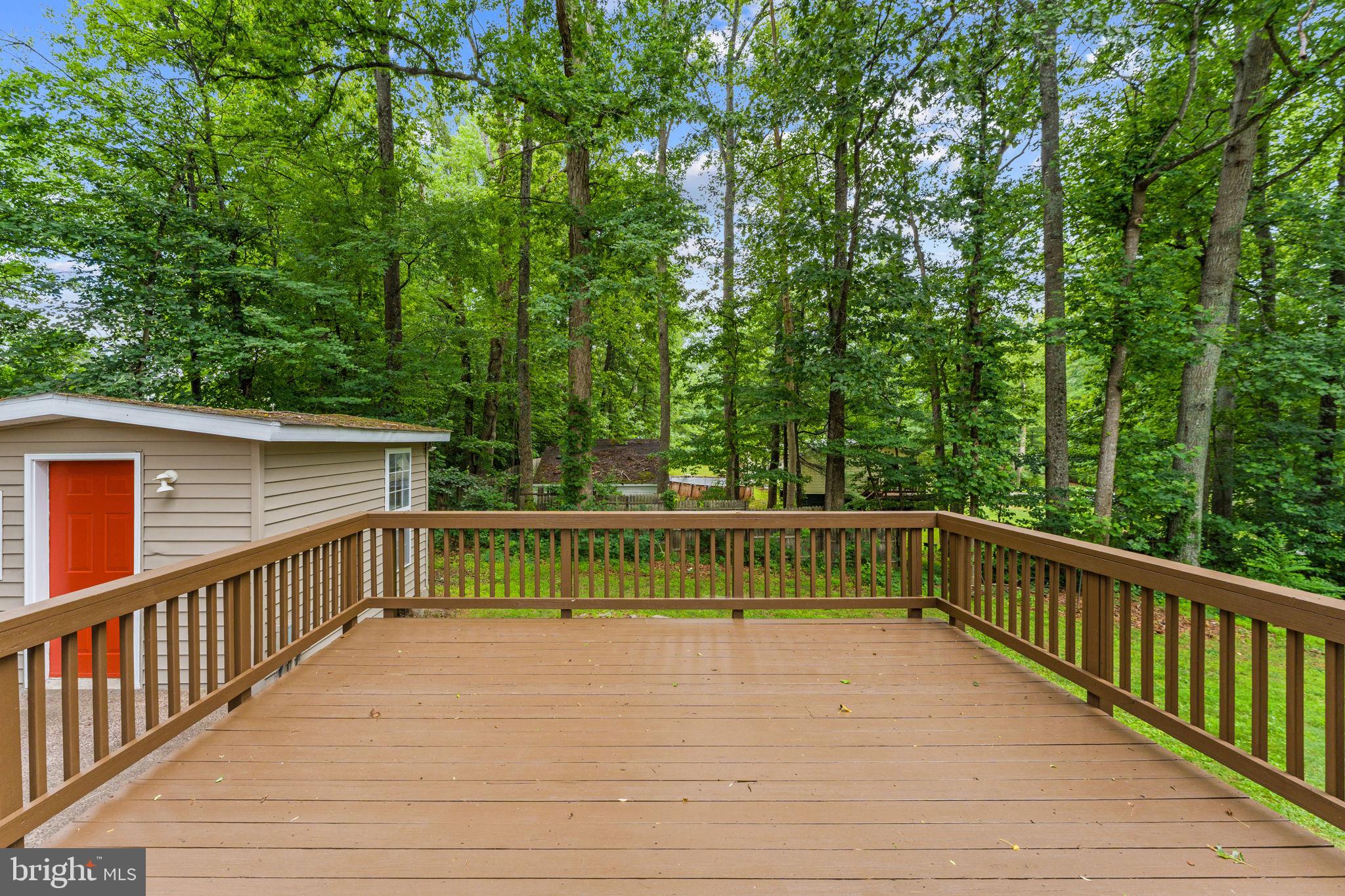 1821 James City Road Reva, VA 22735 - Photo 35 of 44 a view of deck with wooden floor and fence
